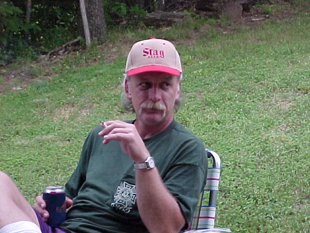 Randy relaxing at Arlyn's lake