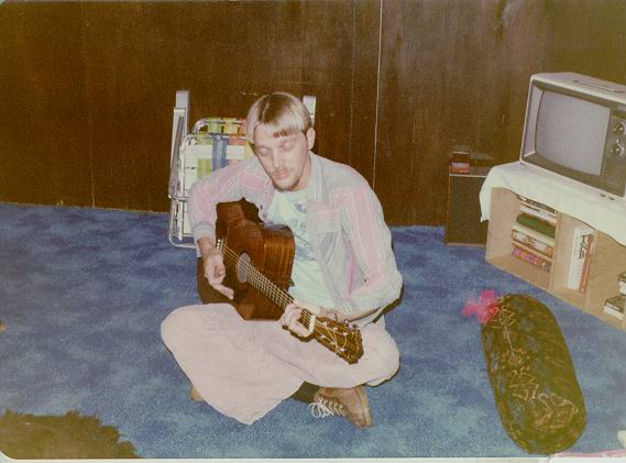 Playing guitar around 1970